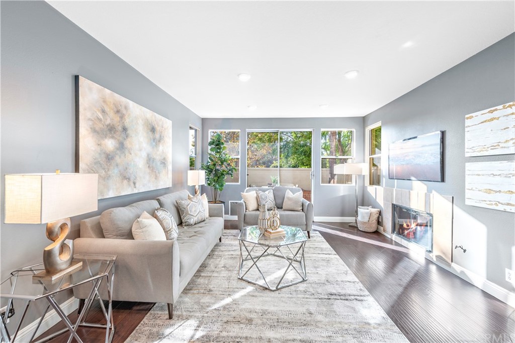2 Vía Entrada Rancho Santa Margarita, CA 92688 - Photo 12 of 35 a living room with furniture and a large window