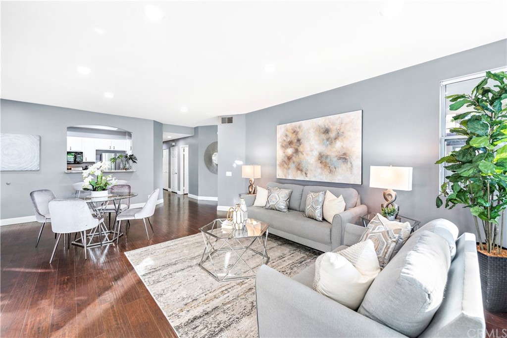 2 Vía Entrada Rancho Santa Margarita, CA 92688 - Photo 13 of 35 a living room with furniture and a potted plant