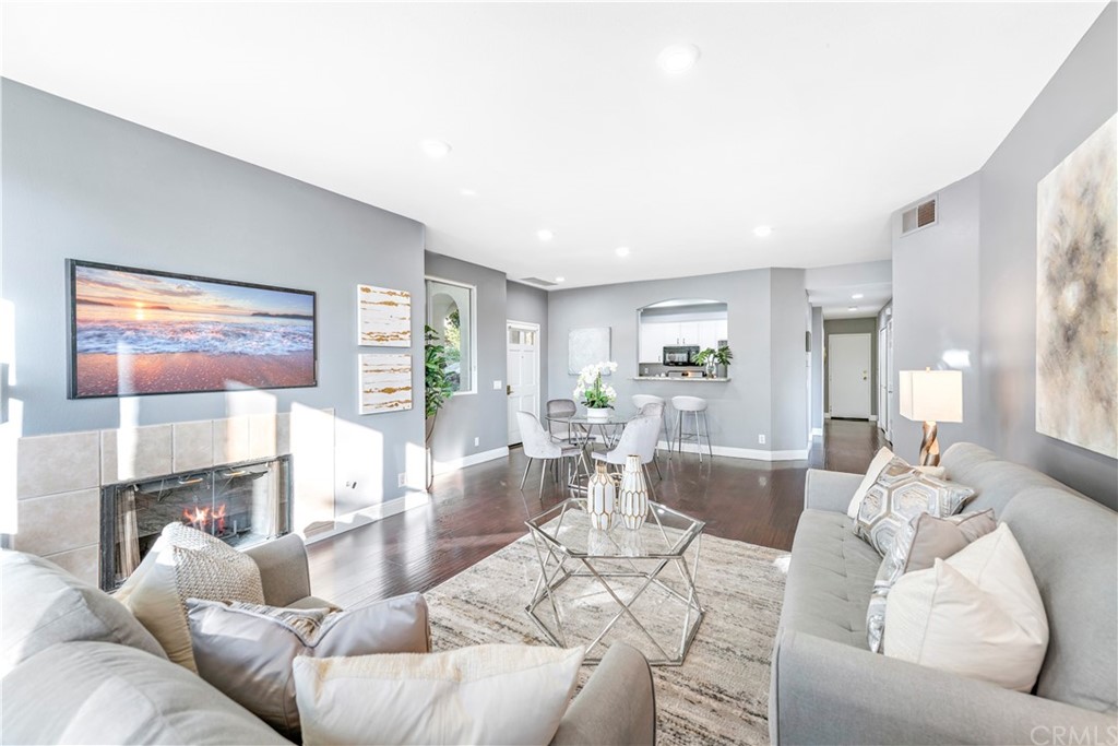 2 Vía Entrada Rancho Santa Margarita, CA 92688 - Photo 14 of 35 a living room with furniture and a large window