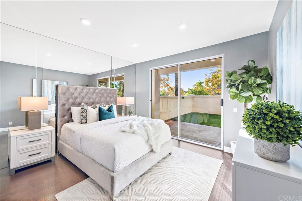 2 Vía Entrada Rancho Santa Margarita, CA 92688 - Photo 15 of 35 a bedroom with a bed and a potted plant