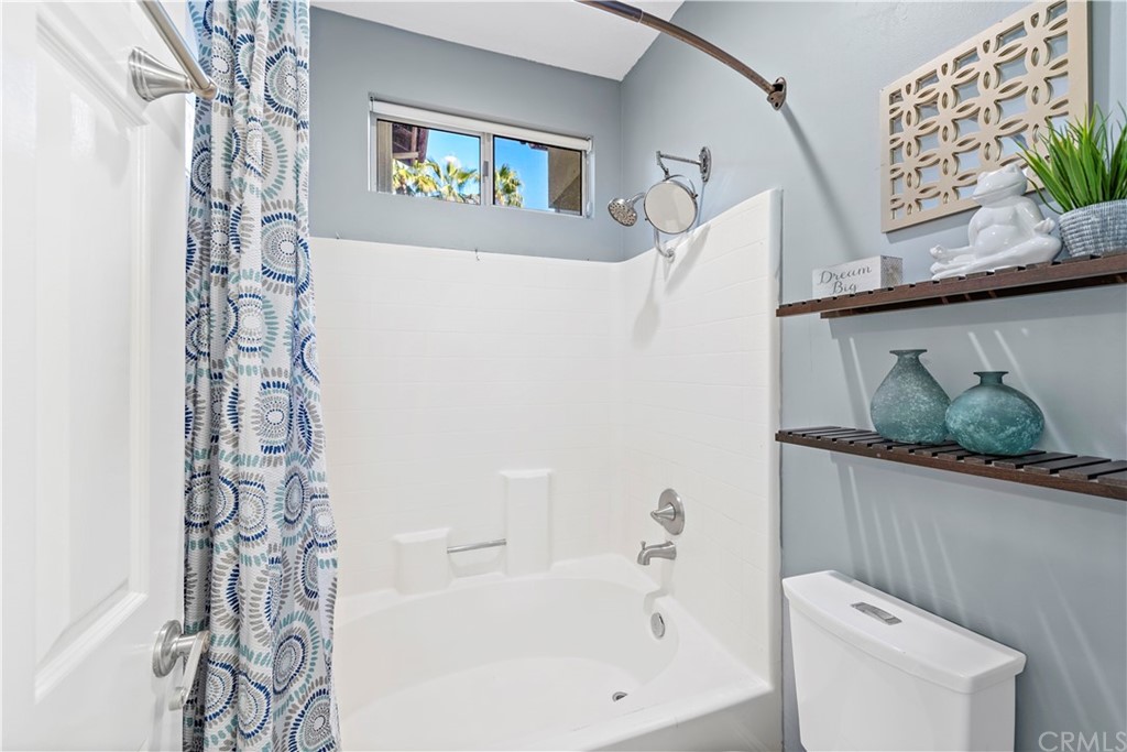 2 Vía Entrada Rancho Santa Margarita, CA 92688 - Photo 18 of 35 a bathroom with a bathtub and shower