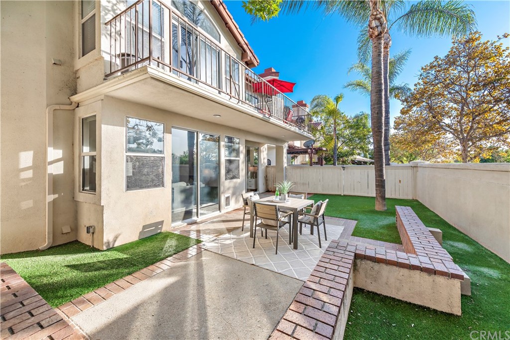 2 Vía Entrada Rancho Santa Margarita, CA 92688 - Photo 25 of 35 a view of a house with backyard and sitting area
