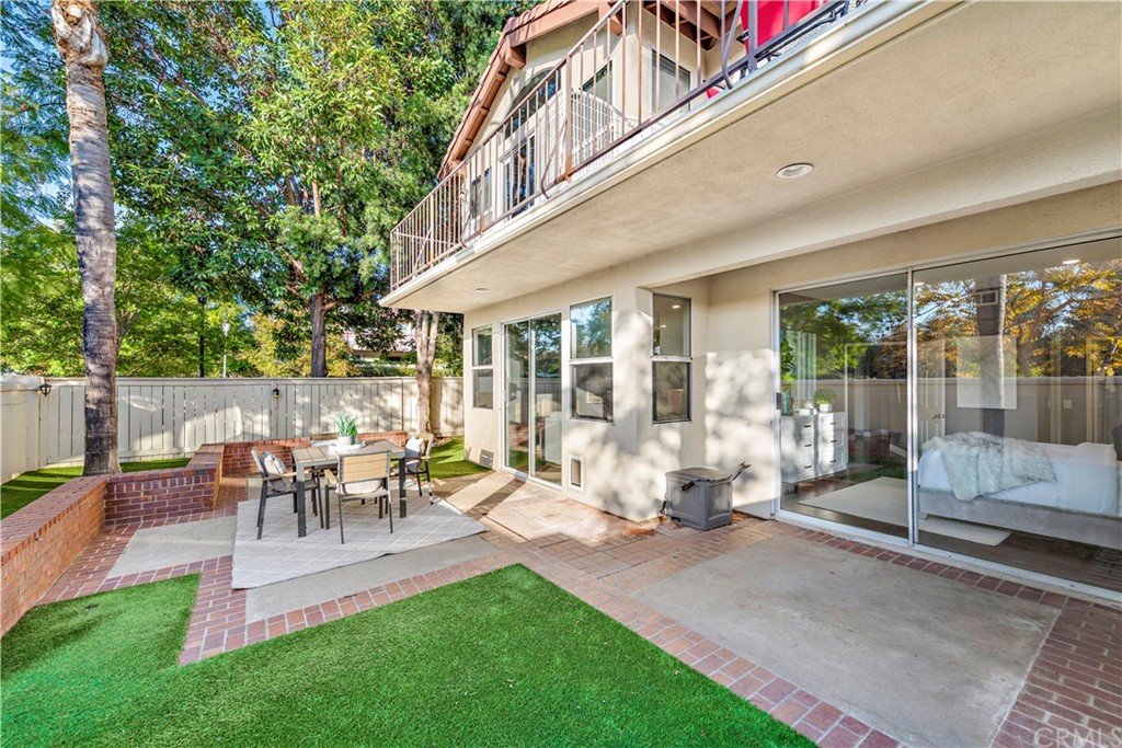 2 Vía Entrada Rancho Santa Margarita, CA 92688 - Photo 30 of 35 a building outdoor space with patio furniture and garden