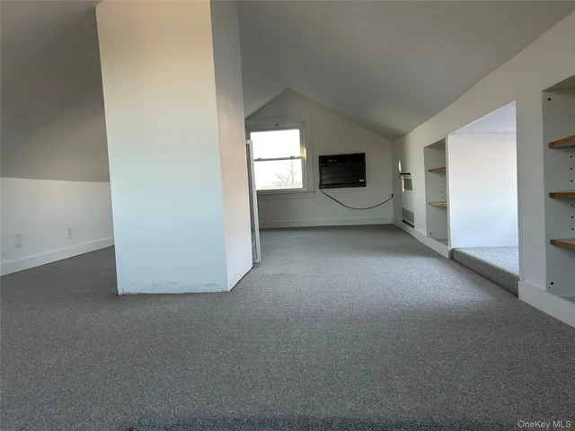 a bathroom with a tub a sink and a shower