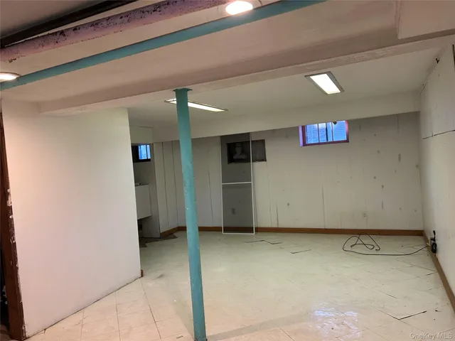 a kitchen with stainless steel appliances granite countertop a stove refrigerator and cabinets