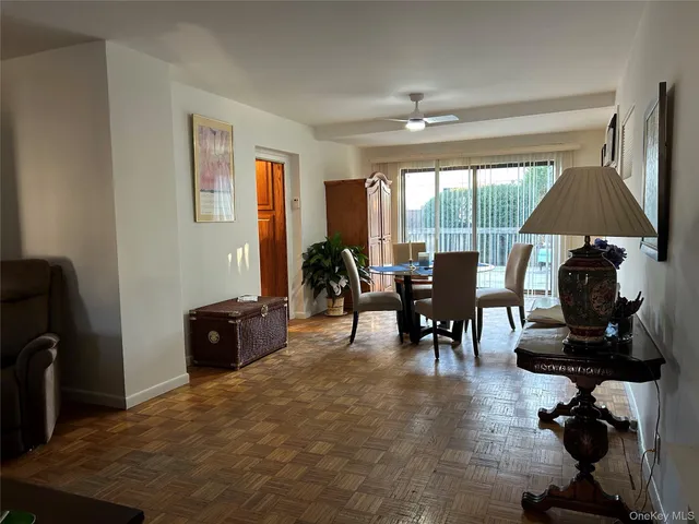 a kitchen with stainless steel appliances granite countertop a sink and a refrigerator
