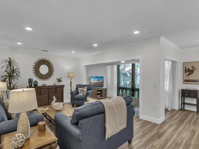 a living room with furniture fireplace and window