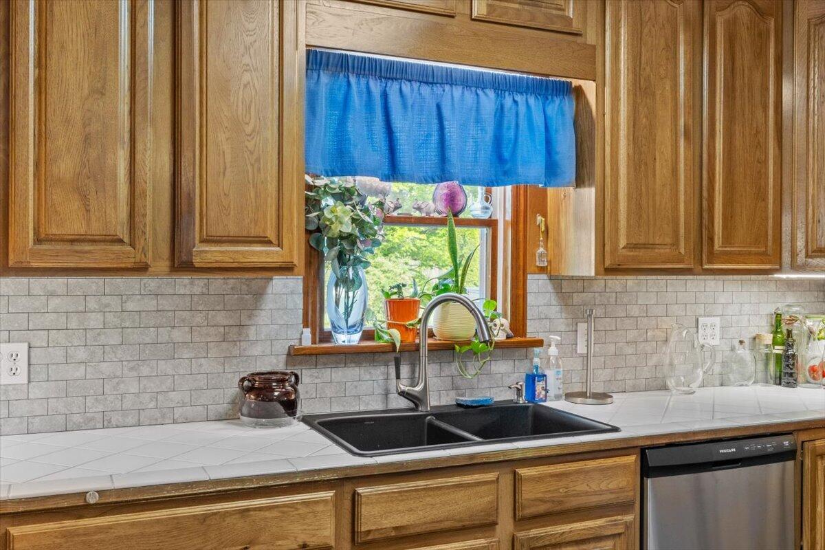 1937 Kunkletown Road Saylorsburg, PA 18353 - Photo 12 of 51 a kitchen with a sink cabinets and window