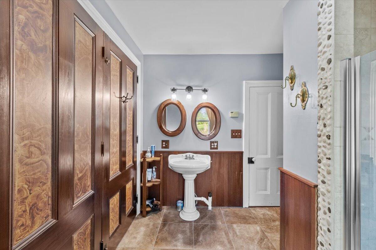 1937 Kunkletown Road Saylorsburg, PA 18353 - Photo 16 of 51 a bathroom with a sink and a mirror