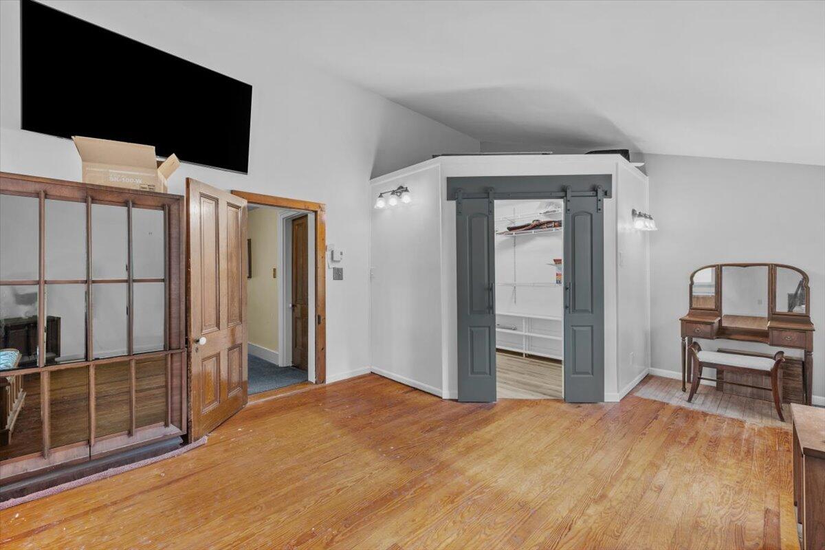 1937 Kunkletown Road Saylorsburg, PA 18353 - Photo 19 of 51 a bedroom with a bed and a flat screen tv