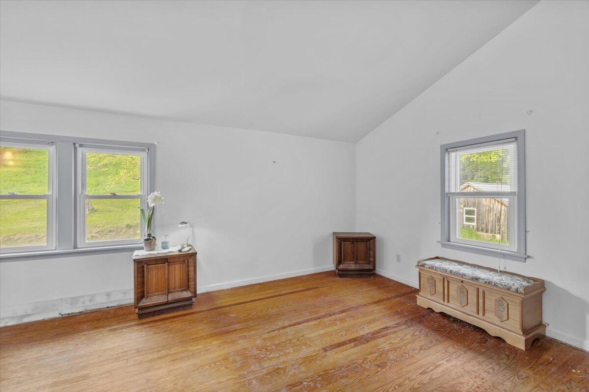 1937 Kunkletown Road Saylorsburg, PA 18353 - Photo 20 of 51 an empty room with a window and wooden floor