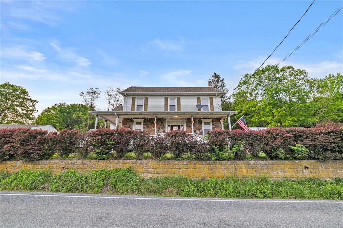1937 Kunkletown Road Saylorsburg, PA 18353 - Photo 2 of 51 a front view of a house with a garden