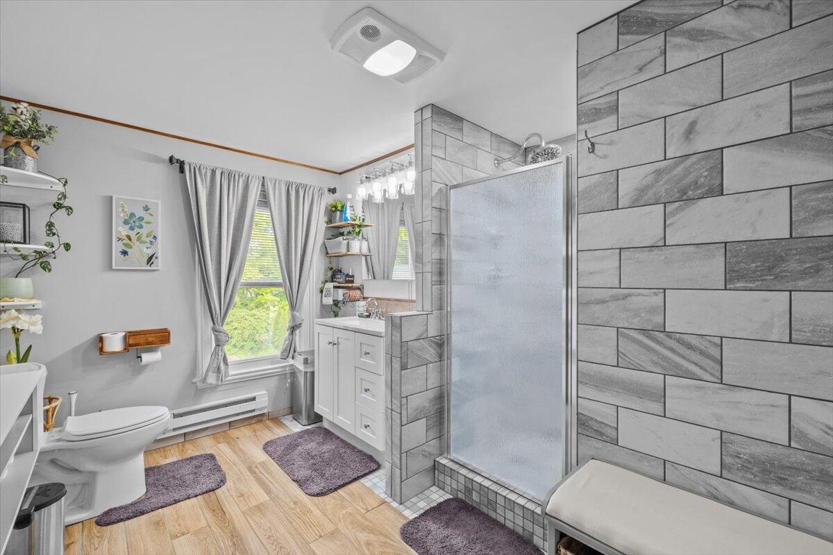 1937 Kunkletown Road Saylorsburg, PA 18353 - Photo 22 of 51 a bathroom with a shower toilet and sink