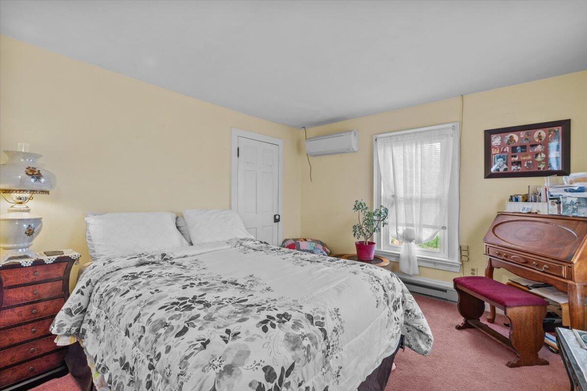 1937 Kunkletown Road Saylorsburg, PA 18353 - Photo 25 of 51 a bedroom with a bed and a chair