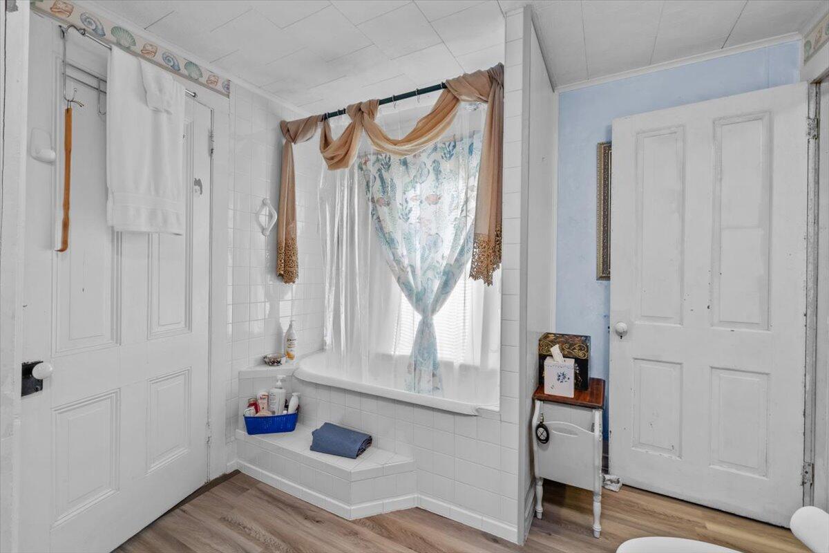 1937 Kunkletown Road Saylorsburg, PA 18353 - Photo 26 of 51 a bathroom with a tub and a window