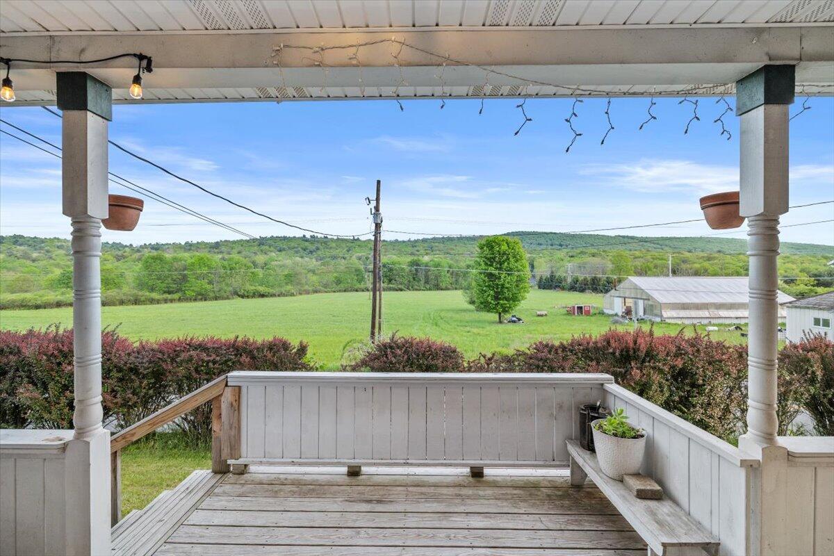 1937 Kunkletown Road Saylorsburg, PA 18353 - Photo 4 of 51 a view of a deck with a floor to ceiling window next to a yard
