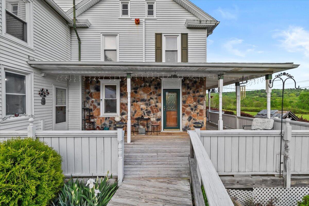 1937 Kunkletown Road Saylorsburg, PA 18353 - Photo 5 of 51 a view of a house with a porch and furniture