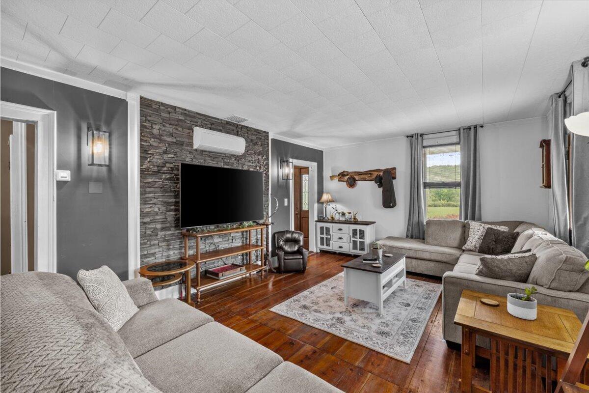 1937 Kunkletown Road Saylorsburg, PA 18353 - Photo 9 of 51 a living room with furniture and a flat screen tv
