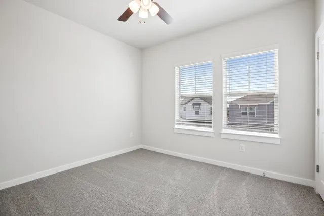 a bathroom with a sink vanity granite and a mirror