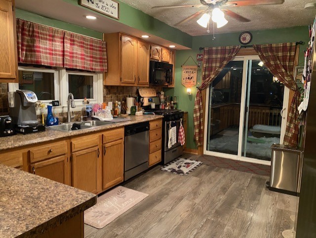 4373 East 250th Road Mendota, IL 61342 - Photo 3 of 26 a kitchen with stainless steel appliances granite countertop a refrigerator a sink a stove and cabinets