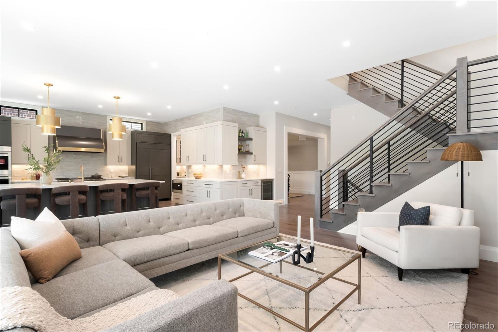 2237 South Madison Street Denver, CO 80210 - Photo 8 of 44 a living room with furniture and kitchen view