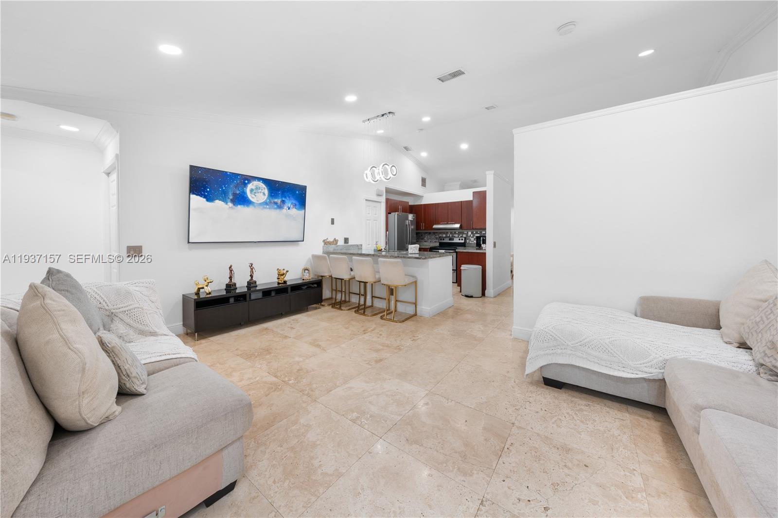 4361 Mahogany Ridge Drive Weston, FL 33331 - Photo 17 of 47 a living room with furniture and a flat screen tv