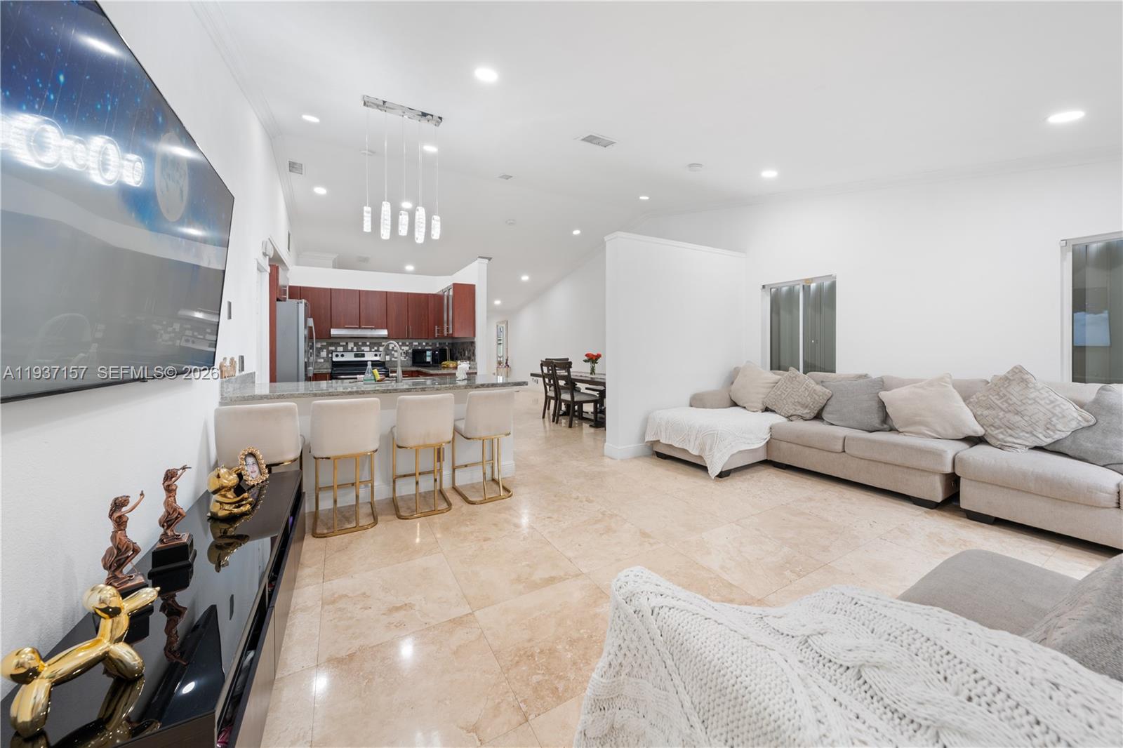 4361 Mahogany Ridge Drive Weston, FL 33331 - Photo 18 of 47 a living room with furniture and a flat screen tv