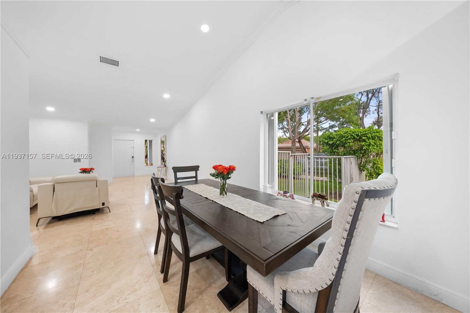 4361 Mahogany Ridge Drive Weston, FL 33331 - Photo 22 of 47 a view of a dining room with furniture and a potted plant