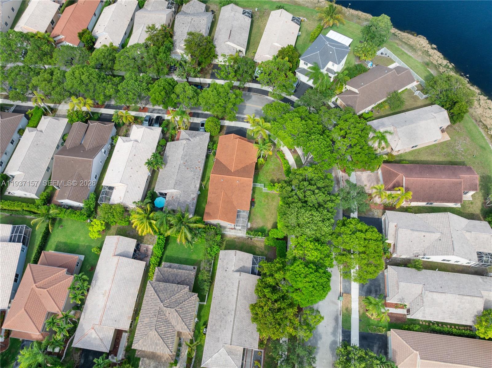 4361 Mahogany Ridge Drive Weston, FL 33331 - Photo 4 of 47 an aerial view of a house with a yard and outdoor seating