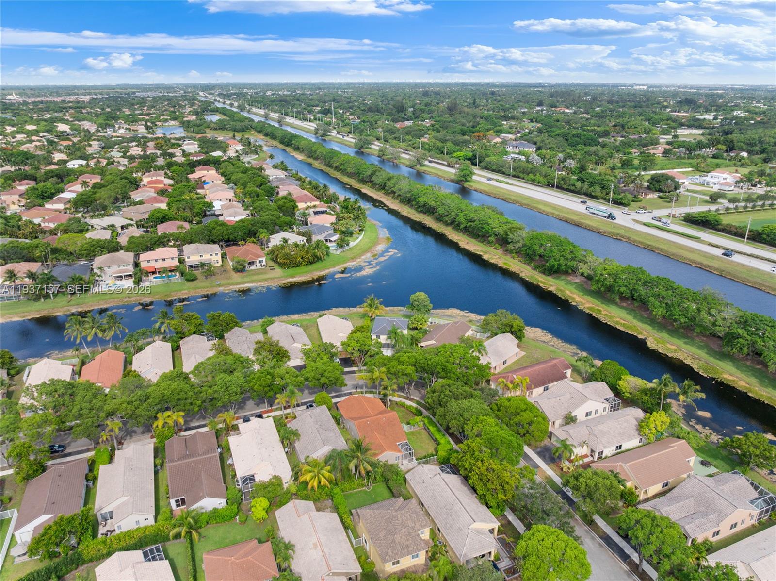 4361 Mahogany Ridge Drive Weston, FL 33331 - Photo 5 of 47 an aerial view of city and lake