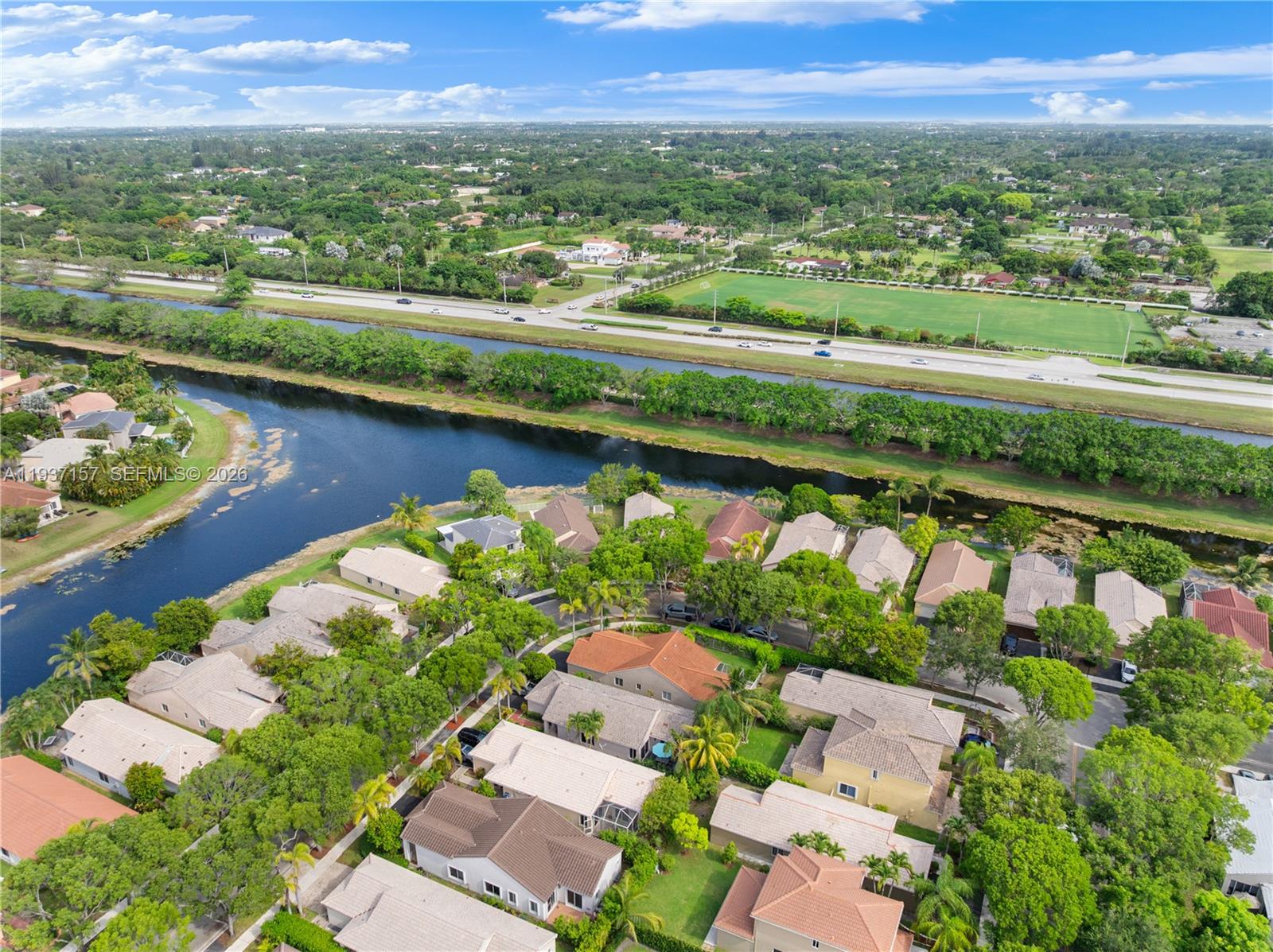 4361 Mahogany Ridge Drive Weston, FL 33331 - Photo 6 of 47 an aerial view of river residential house with swimming pool and outdoor space