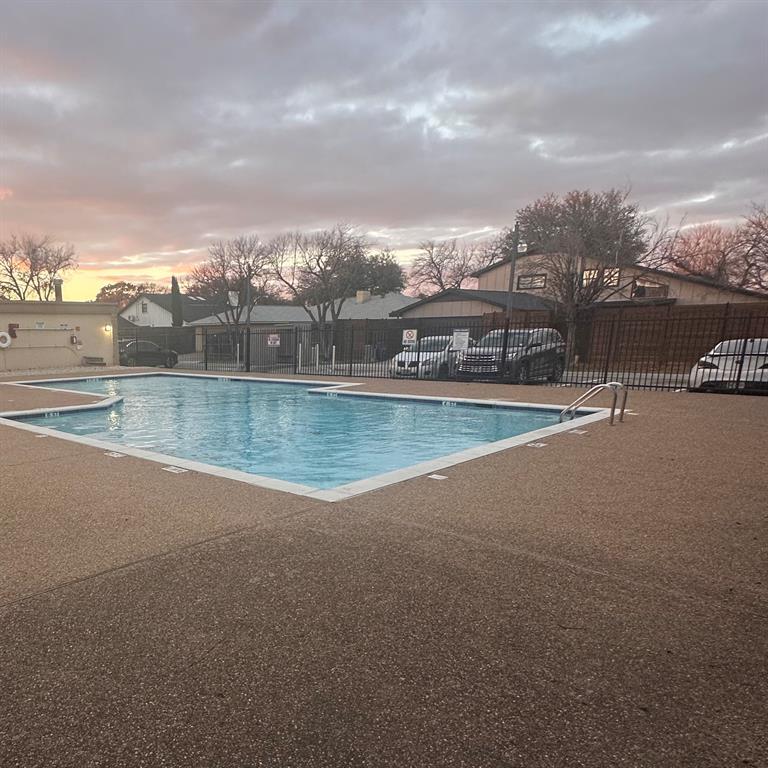 Undisclosed Address Dallas, TX 75220 - Photo 20 of 22 a view of a lake with houses