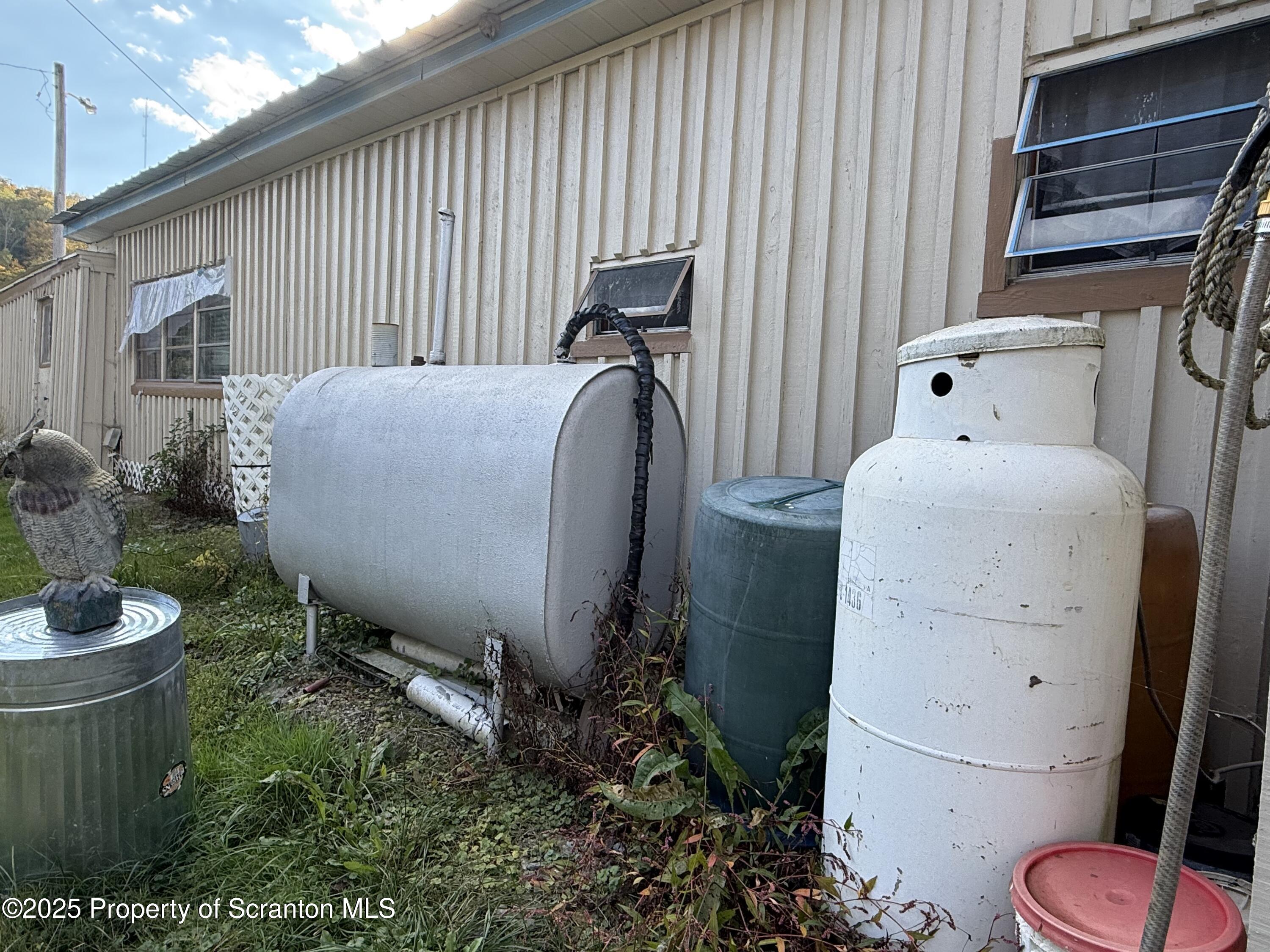 130 Fisk Mill Road Montrose, PA 18801 - Photo 24 of 31 a bathroom with a toilet a sink and mirror