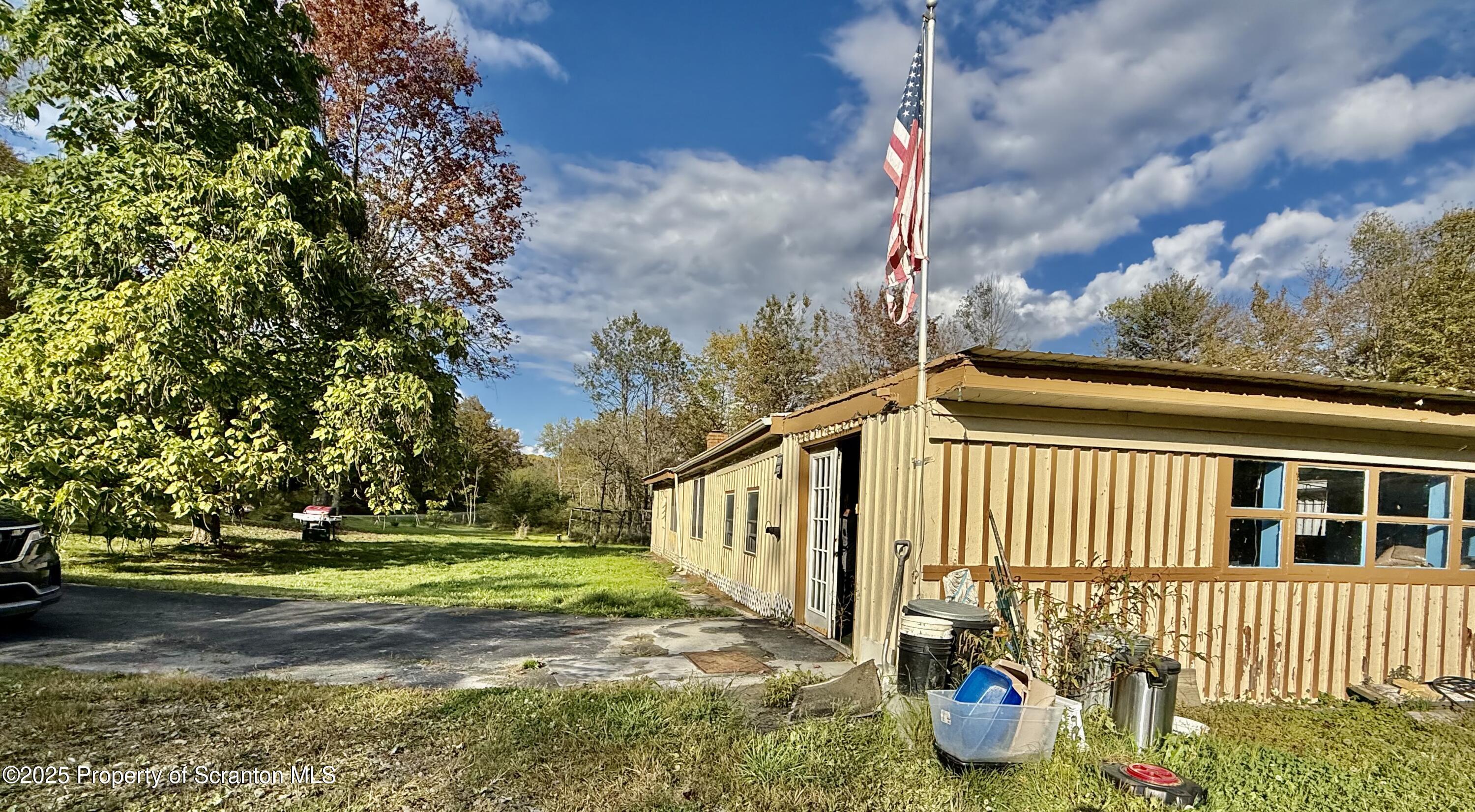 130 Fisk Mill Road Montrose, PA 18801 - Photo 30 of 31 a view of a pathway of a house with a yard