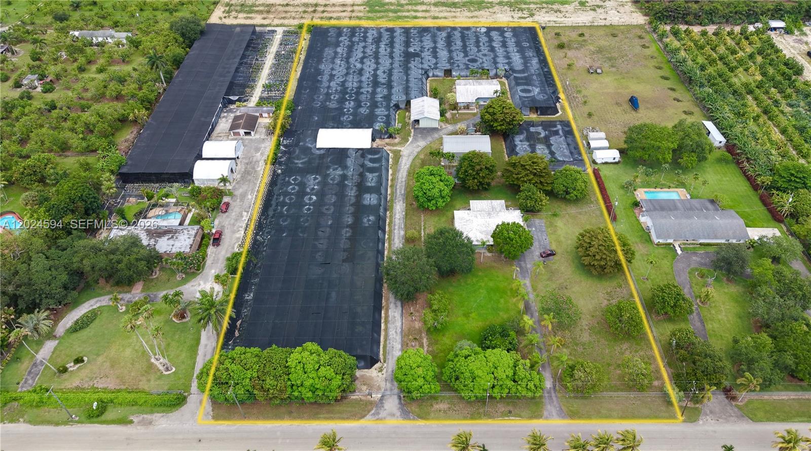 17355 Southwest 256th Street Homestead, FL 33031 - Photo 1 of 32 an aerial view of a house