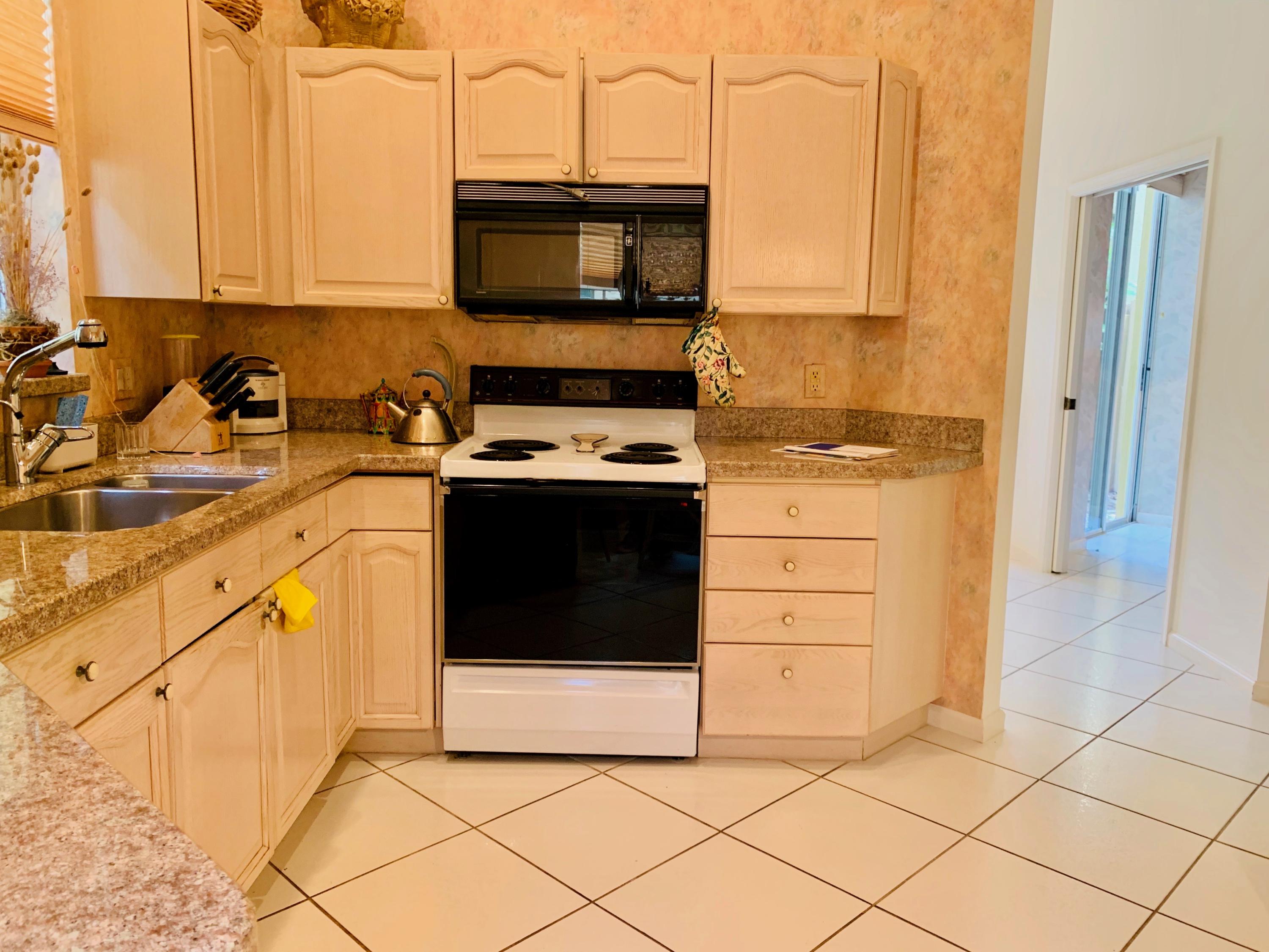 6661 Northwest 25th Court Boca Raton, FL 33496 - Photo 3 of 24 Kitchen 1