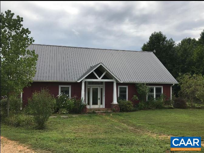 8497 Laurel Road Shipman, VA 22971 - Photo 1 of 37 a front view of a house with a garden