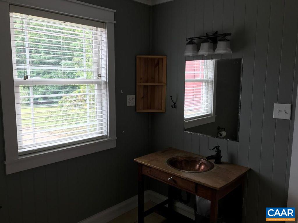 8497 Laurel Road Shipman, VA 22971 - Photo 19 of 37 a room with a window a desk and chair