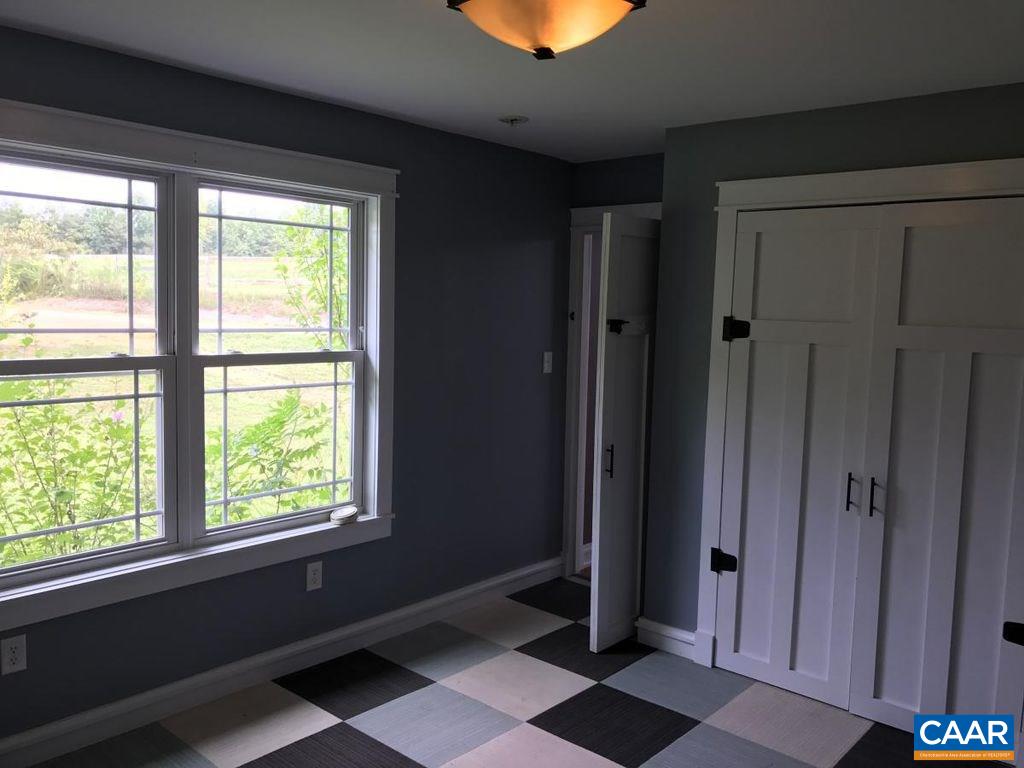 8497 Laurel Road Shipman, VA 22971 - Photo 20 of 37 a view of an empty room with a window