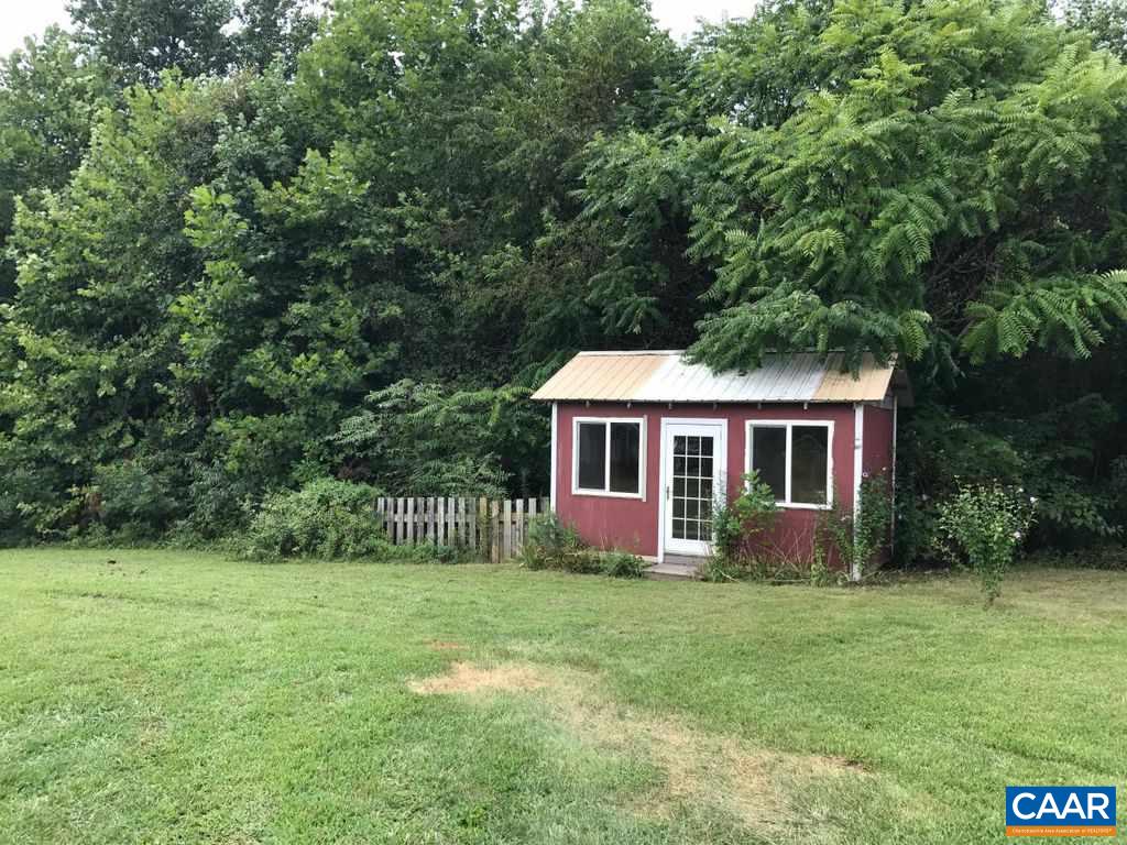 8497 Laurel Road Shipman, VA 22971 - Photo 36 of 37 a front view of a house with garden