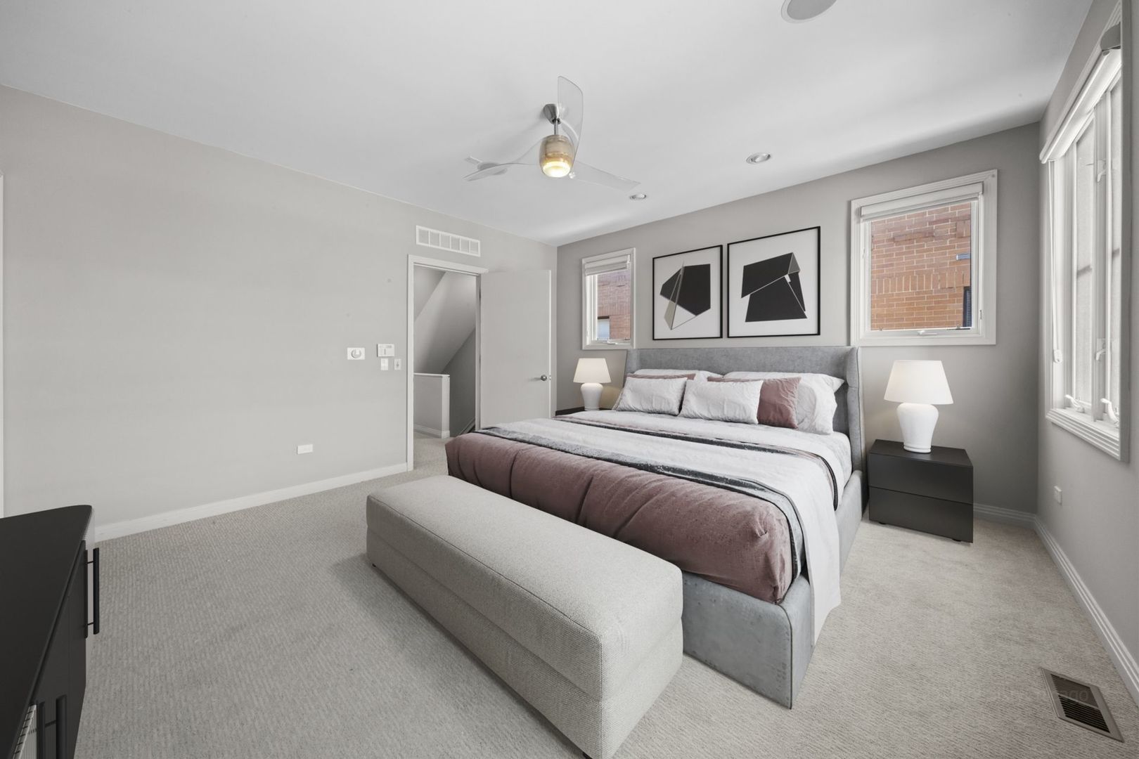 1137 West Monroe Street, Unit 17 Chicago, IL 60607 - Photo 15 of 41 a bedroom with a bed and a couch