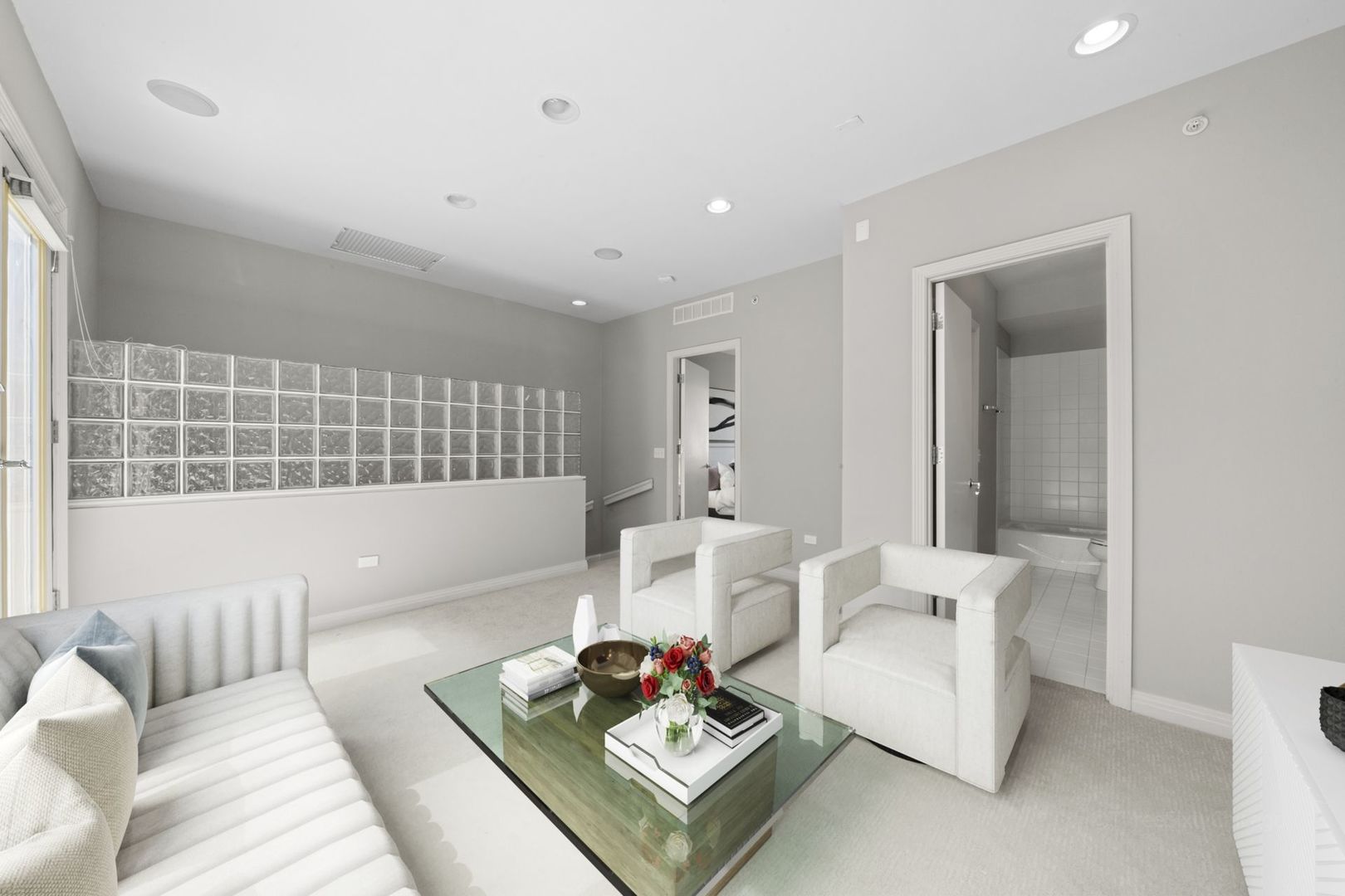 1137 West Monroe Street, Unit 17 Chicago, IL 60607 - Photo 24 of 41 a living room with furniture and a table