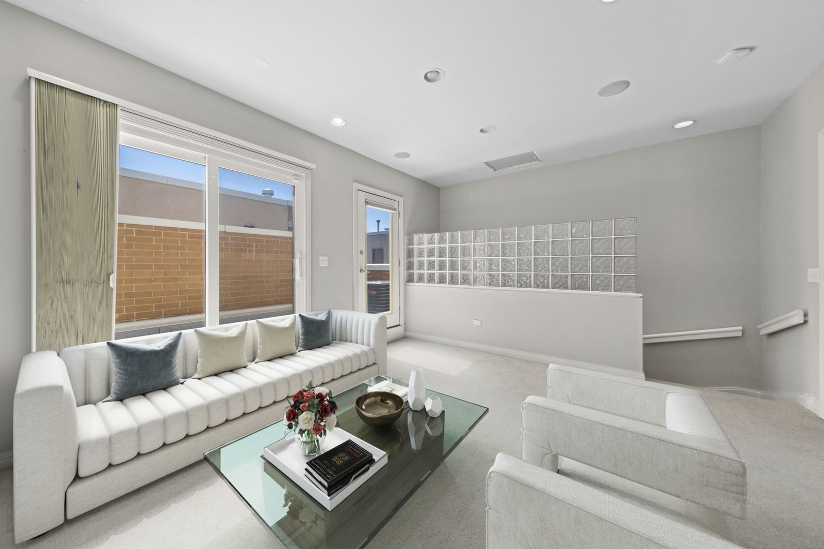 1137 West Monroe Street, Unit 17 Chicago, IL 60607 - Photo 25 of 41 a living room with furniture and a window