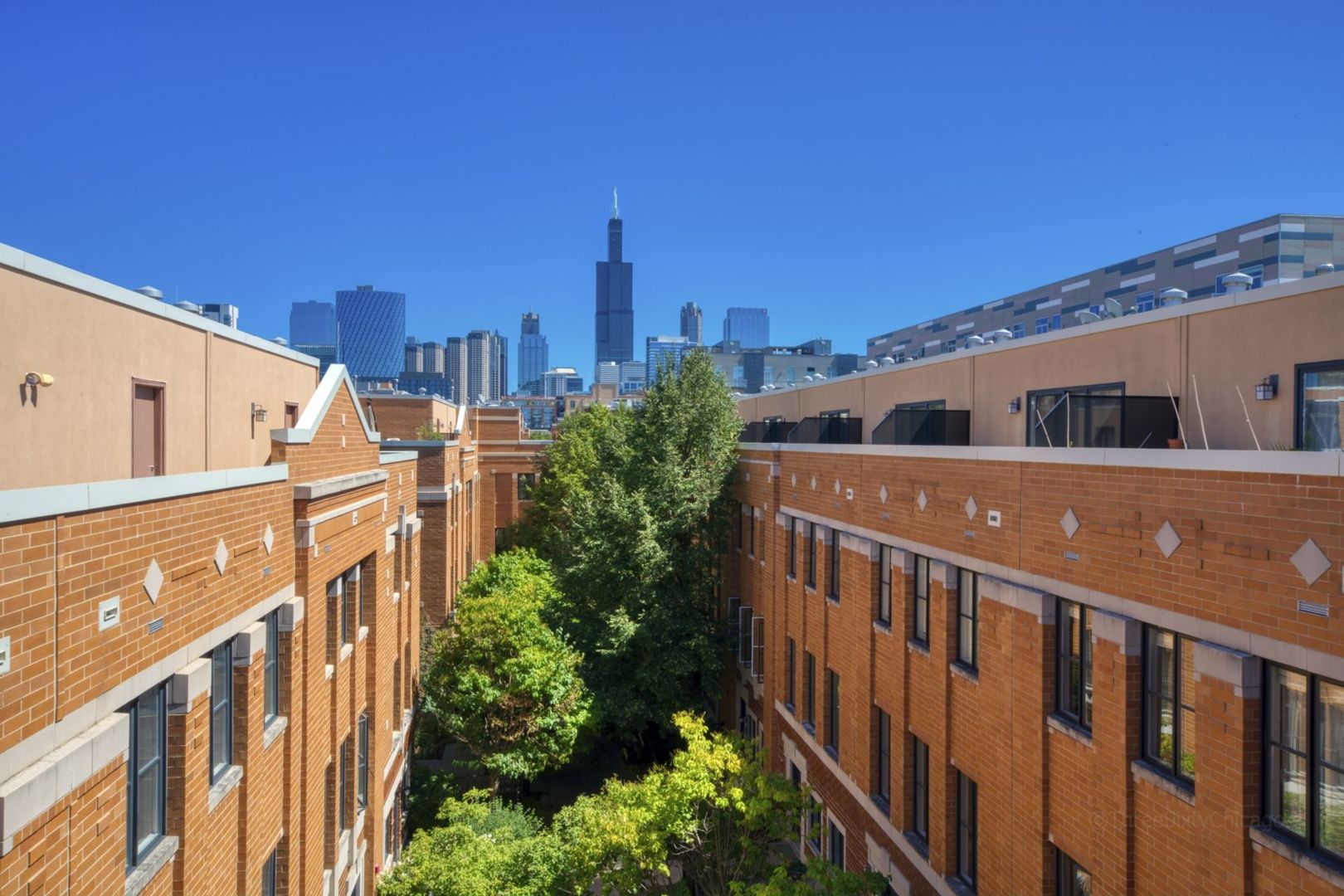 1137 West Monroe Street, Unit 17 Chicago, IL 60607 - Photo 27 of 41 a view of a balcony with an outdoor space