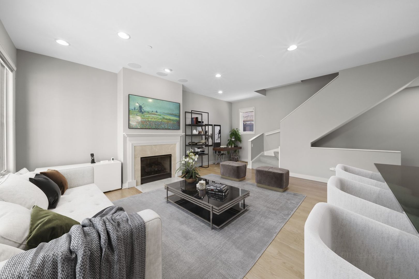 1137 West Monroe Street, Unit 17 Chicago, IL 60607 - Photo 3 of 41 a living room with furniture fireplace and a flat screen tv
