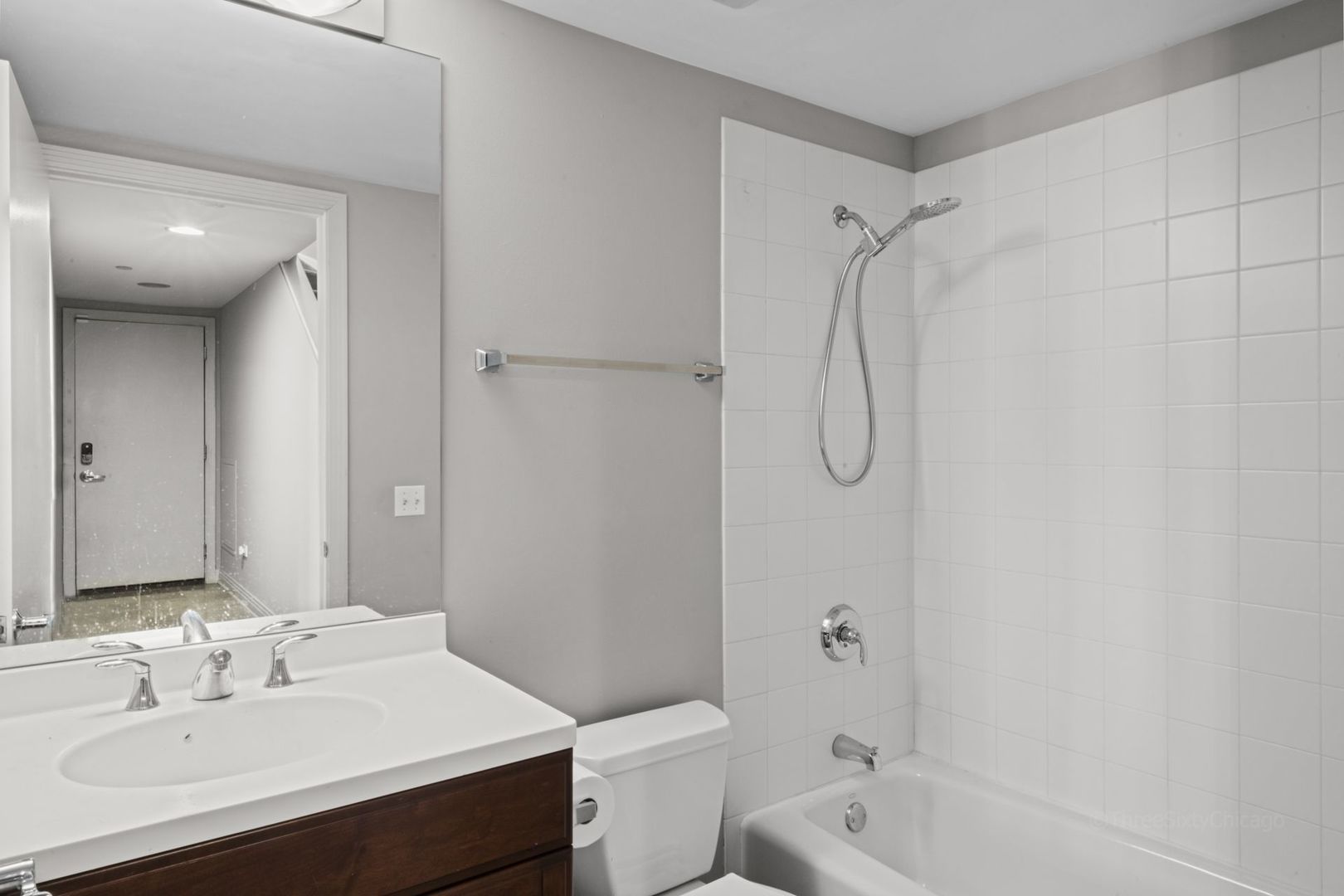 1137 West Monroe Street, Unit 17 Chicago, IL 60607 - Photo 33 of 41 a bathroom with a sink toilet and shower