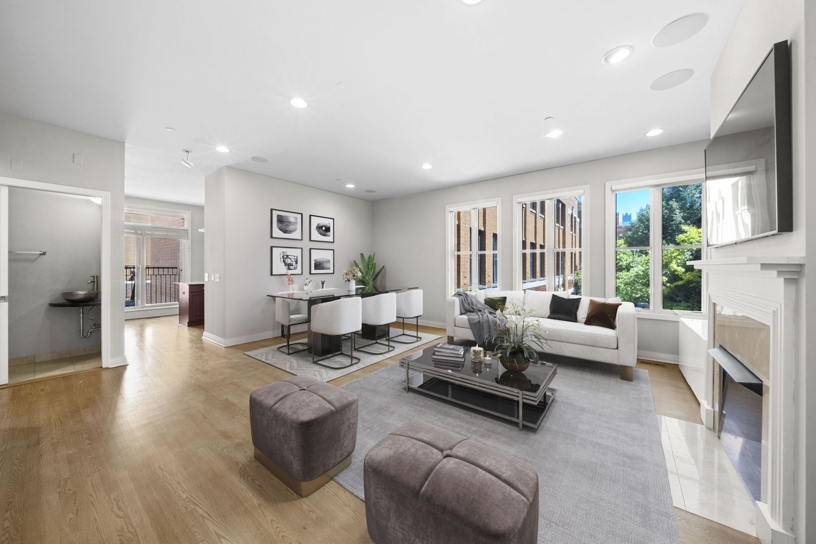 1137 West Monroe Street, Unit 17 Chicago, IL 60607 - Photo 4 of 41 a living room with furniture and large windows