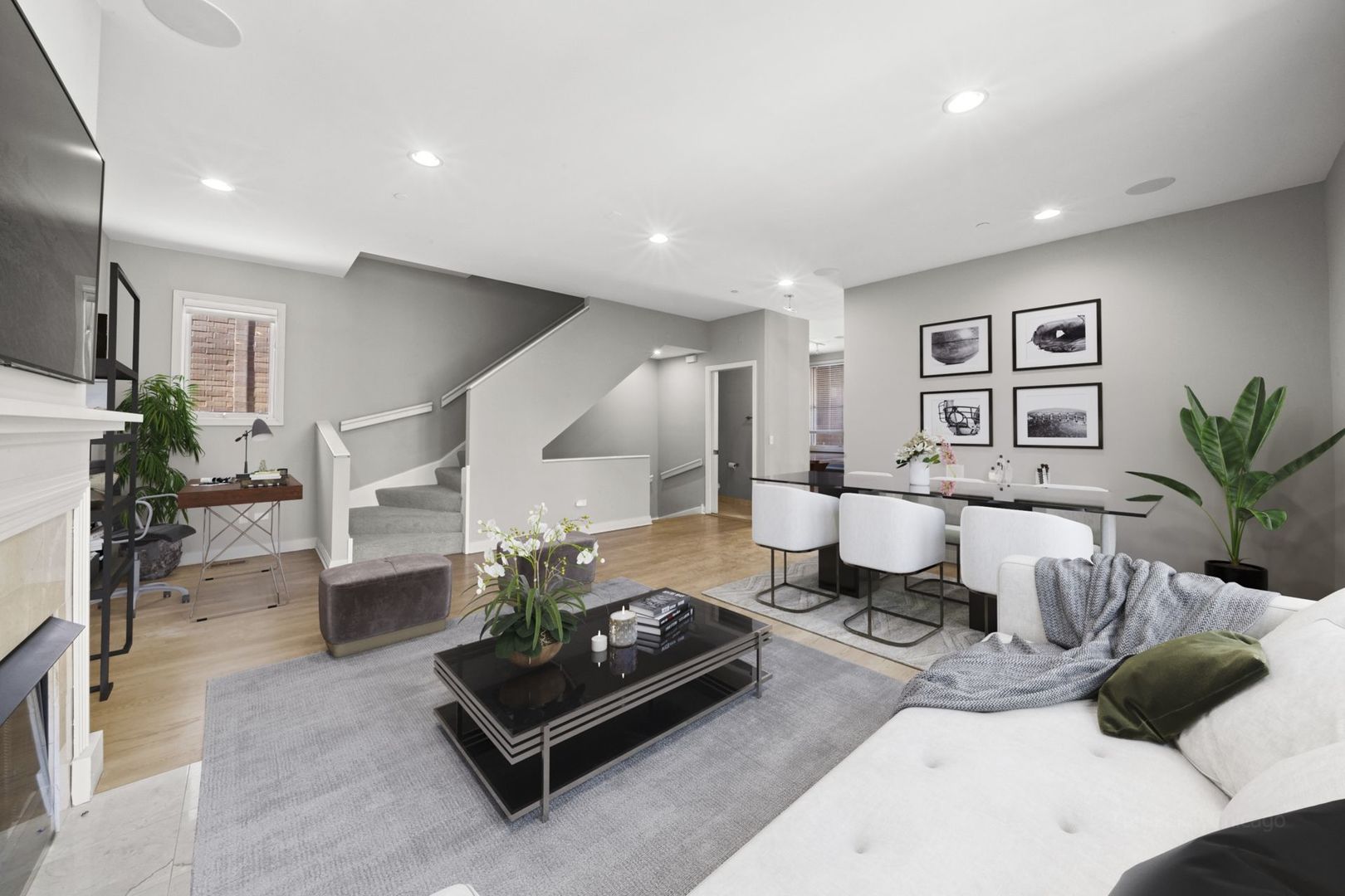 1137 West Monroe Street, Unit 17 Chicago, IL 60607 - Photo 5 of 41 a living room with furniture potted plant and a window