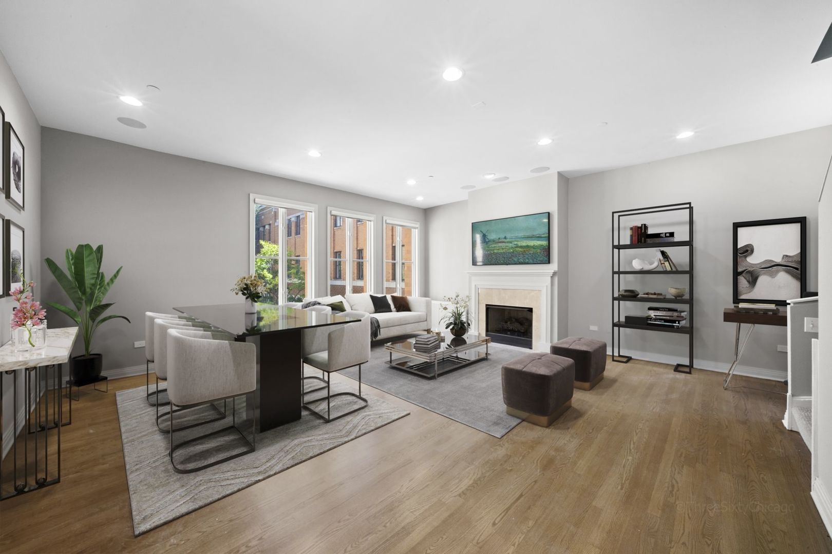1137 West Monroe Street, Unit 17 Chicago, IL 60607 - Photo 6 of 41 a living room with furniture a fireplace and a potted plant