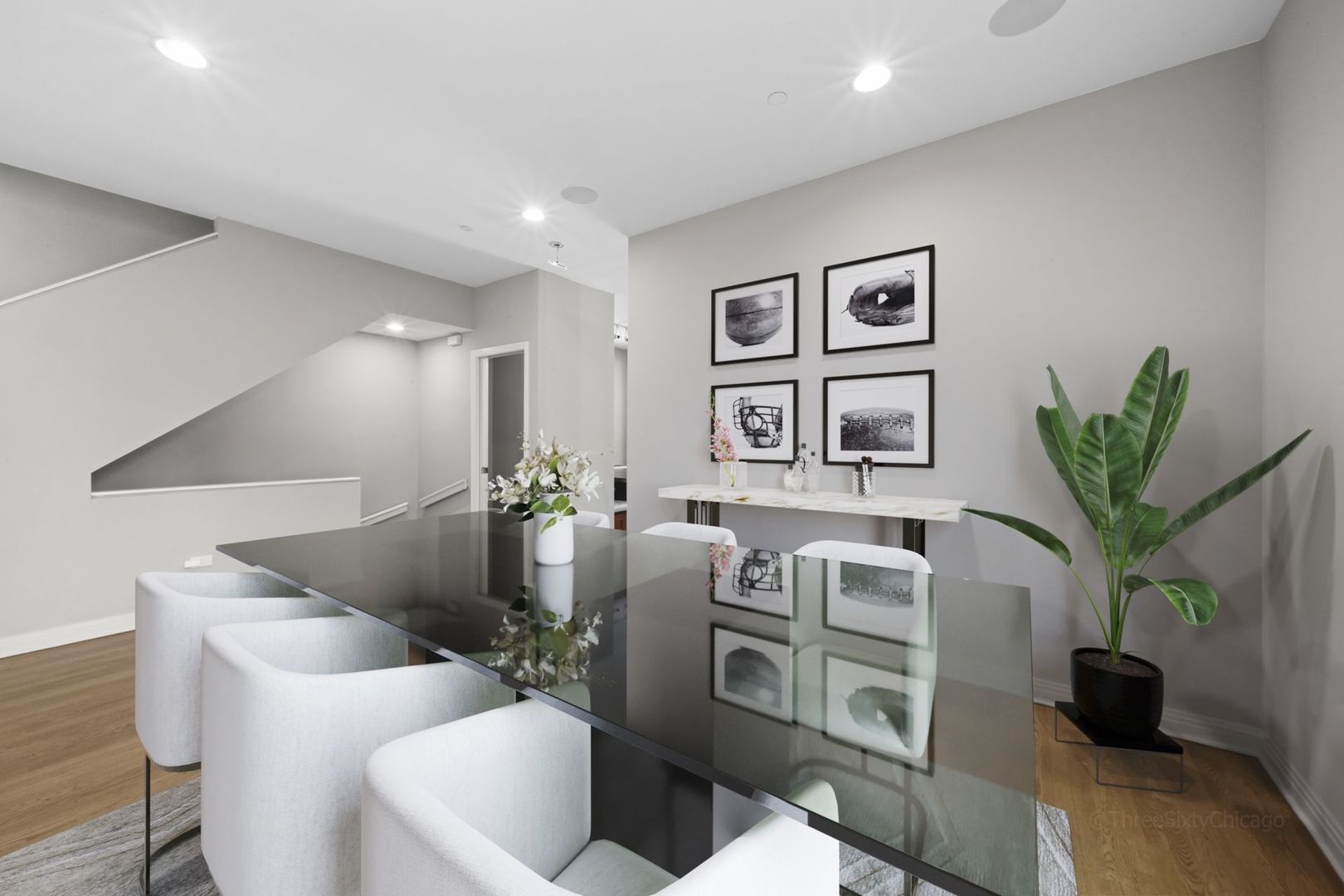 1137 West Monroe Street, Unit 17 Chicago, IL 60607 - Photo 7 of 41 a living room with furniture potted plant and a lamp